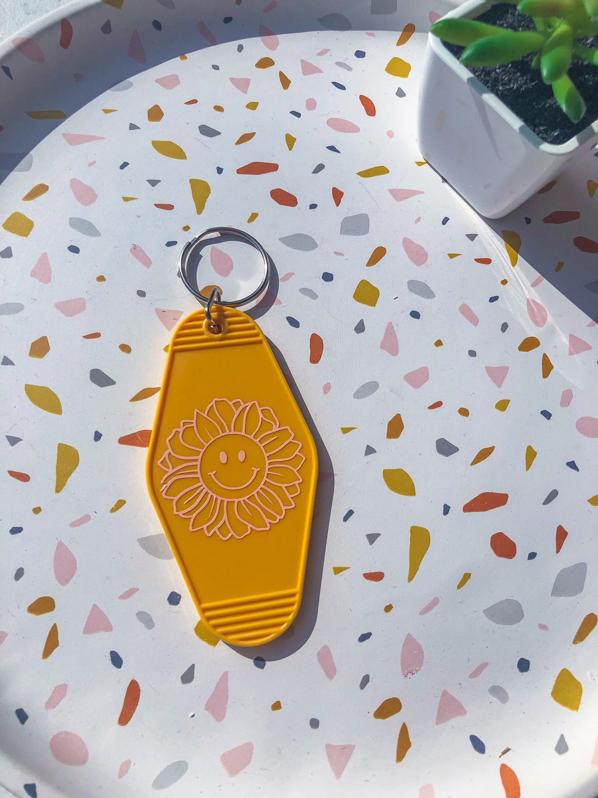 Yellow Flower Smiley Face Motel Keychain - ShopCassiesCrafts