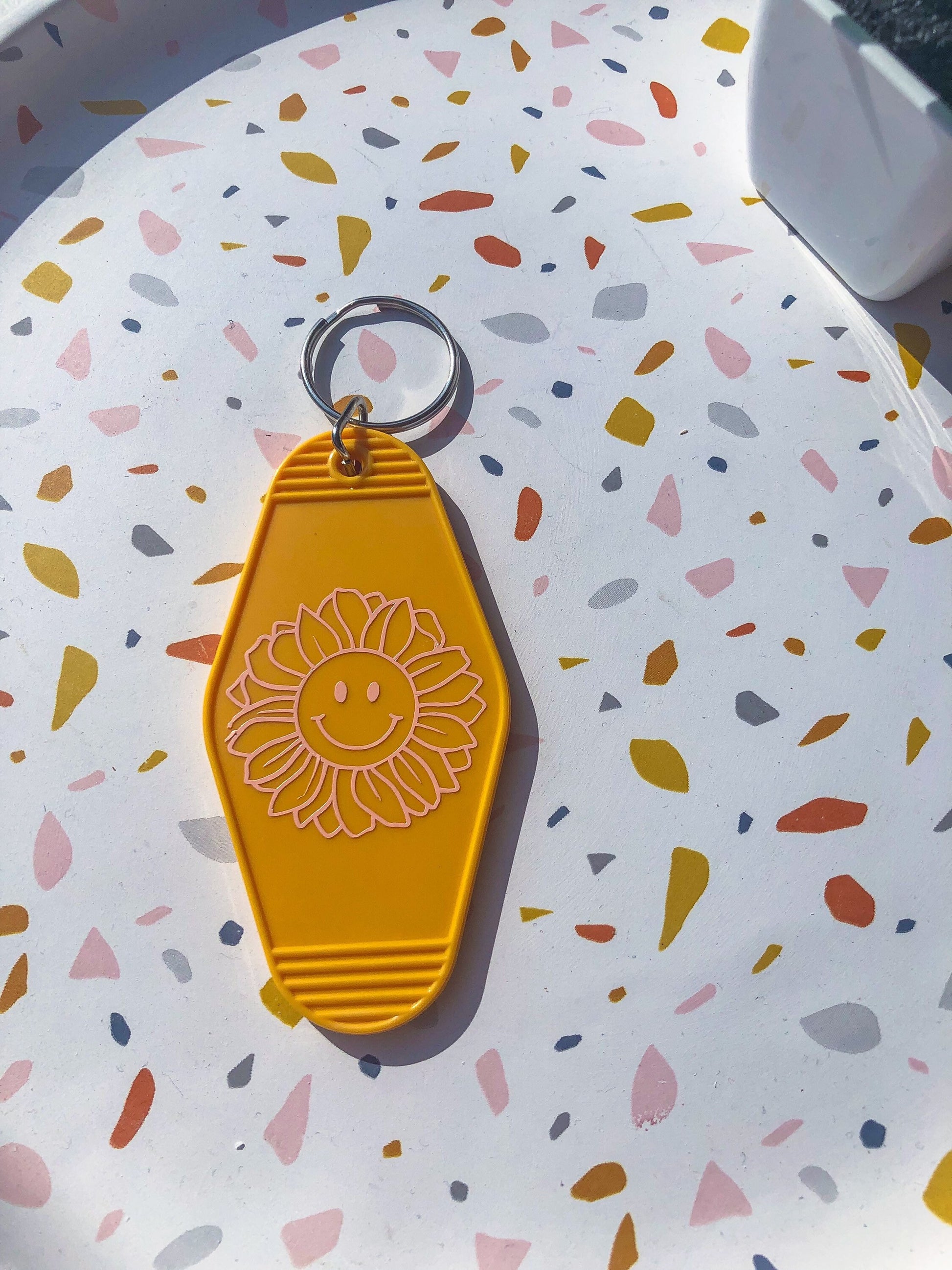 Yellow Flower Smiley Face Motel Keychain - ShopCassiesCrafts