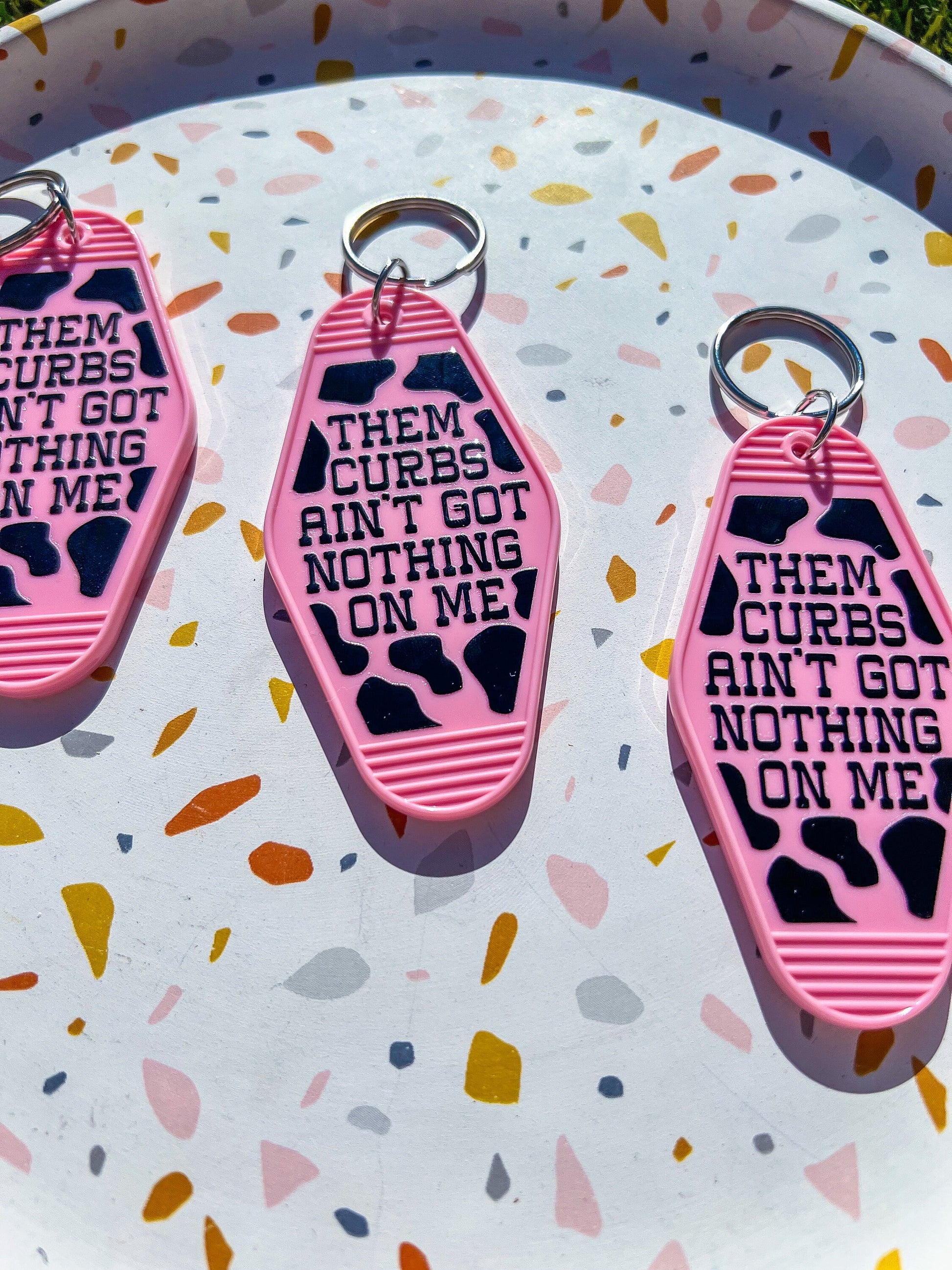 Pink "Them Curbs Aint Got Nothin On Me" Motel Keychain - ShopCassiesCrafts