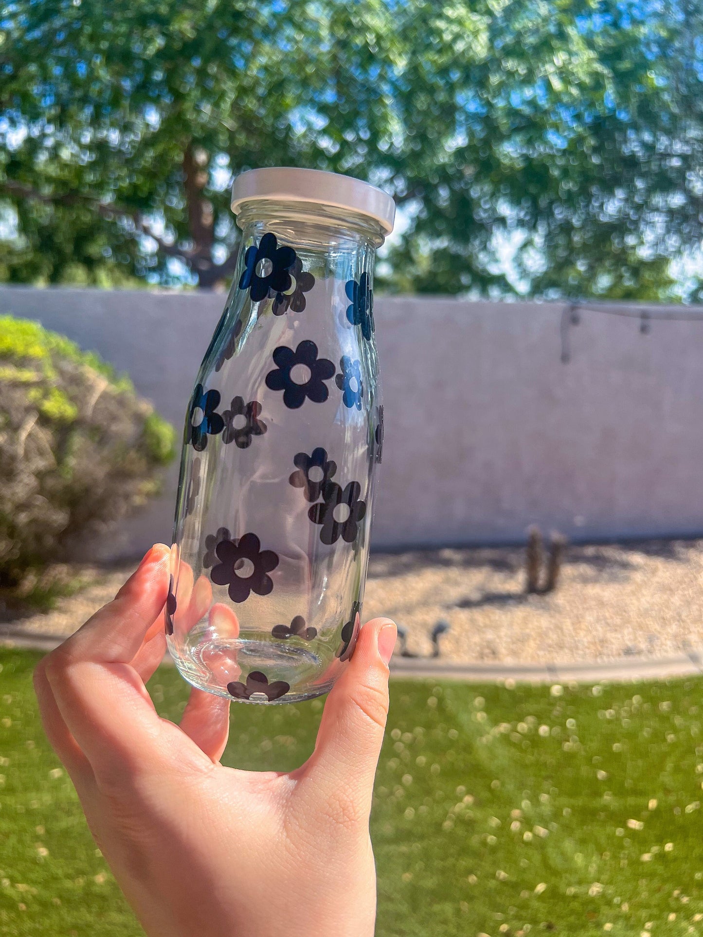 Black Flowers Decorated Glass Milk Bottle with Lid