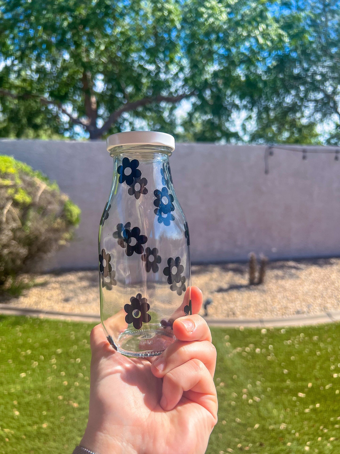 Black Flowers Decorated Glass Milk Bottle with Lid